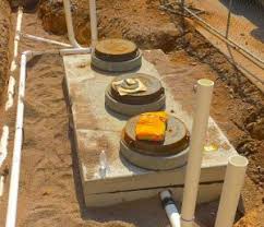 In-ground septic system access lids at a Madison County property